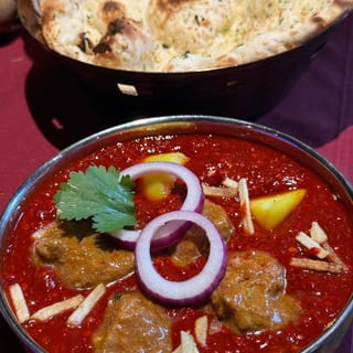 Lamb Vindaloo** very spicy